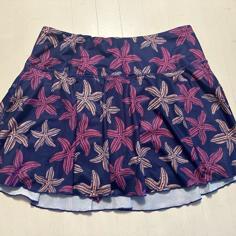 Zoot purple w/ pink and peach starfish tennis skort